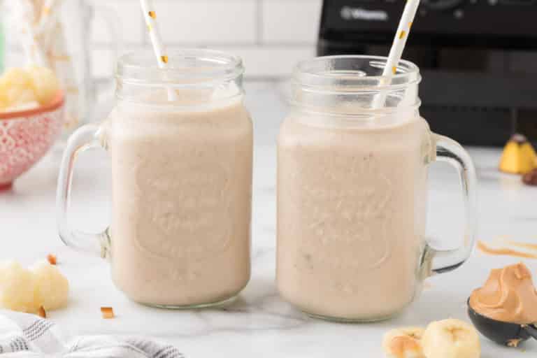 peanut butter cauliflower smoothie with straws.