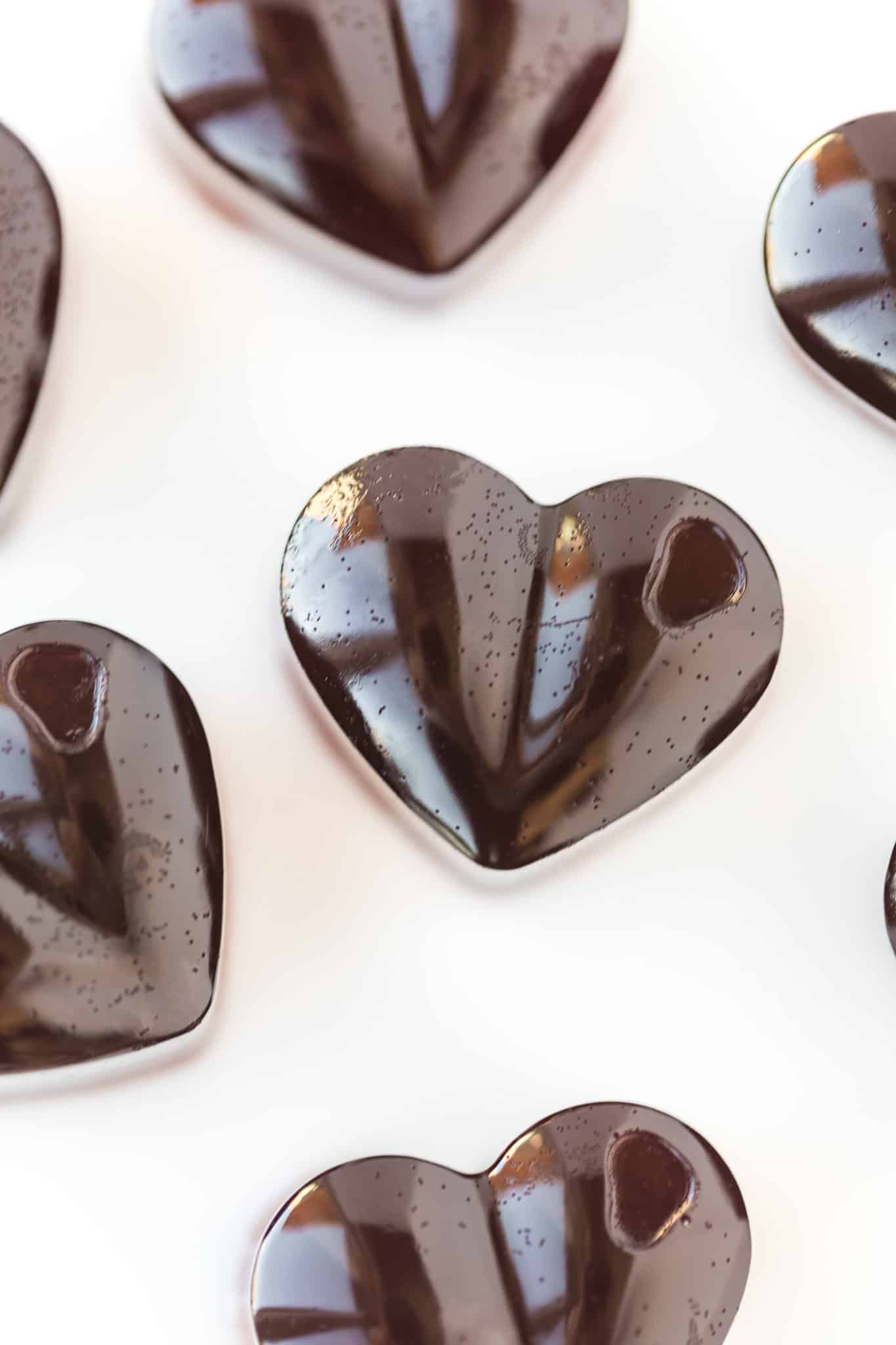 heart shaped pink gummy on a table.