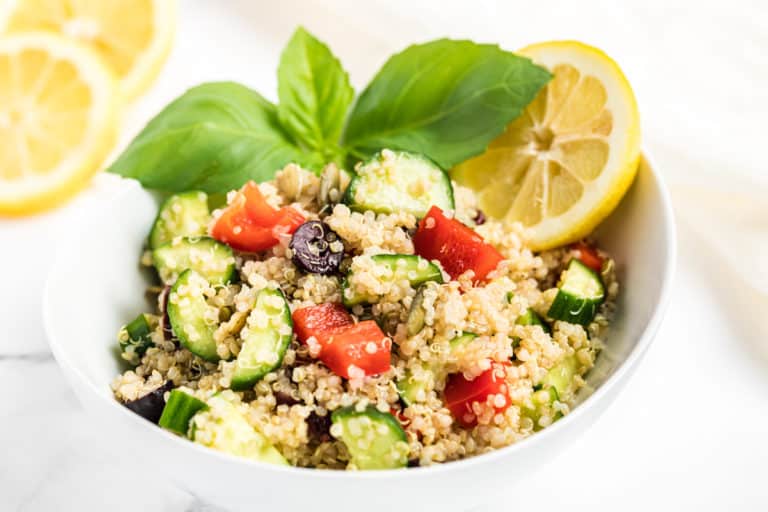 A bowl of quinoa salad with vegetables