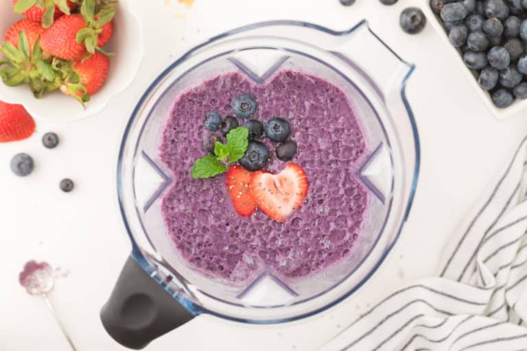 strawberry blueberry smoothie in a blender