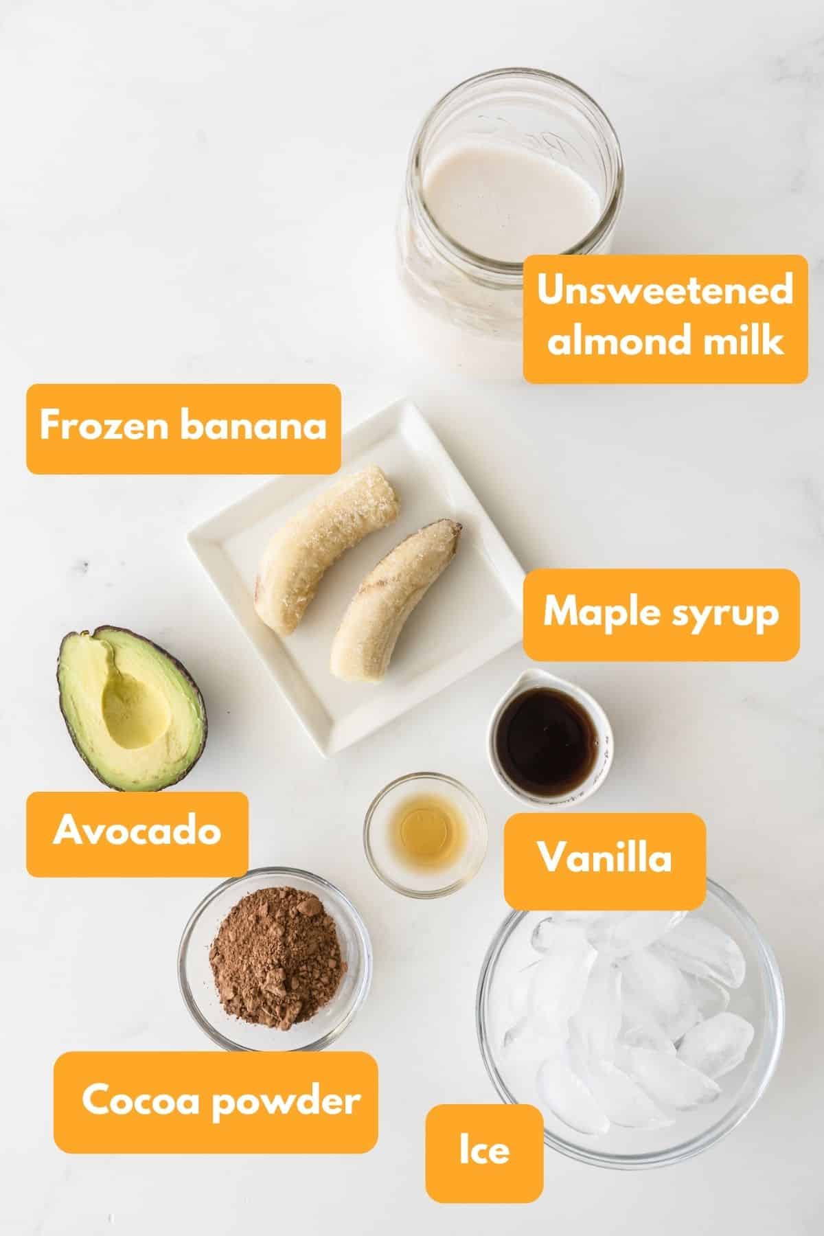 Ingredients for a chocolate avocado smoothie.