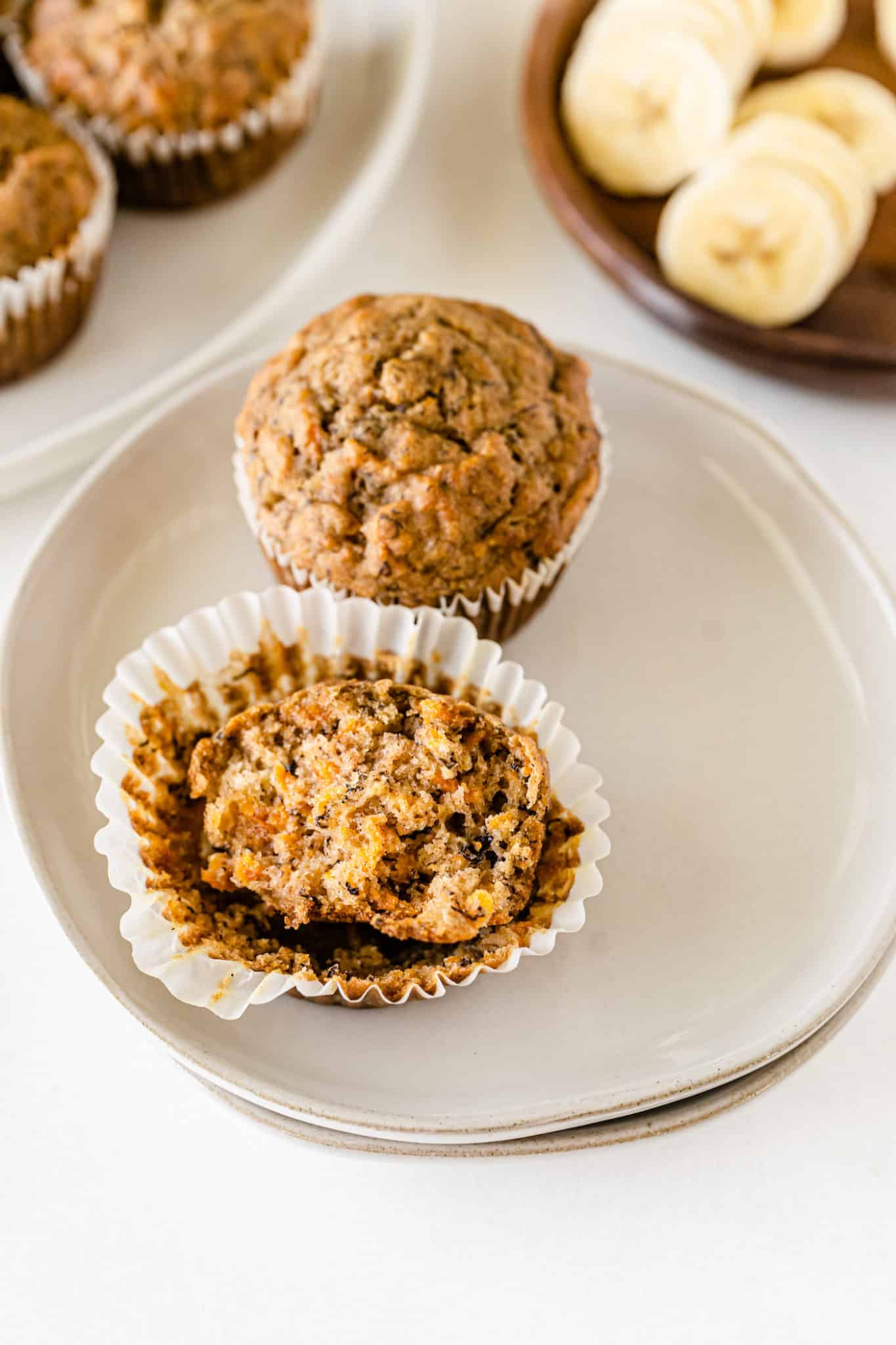 banana carrot muffin served on a plate.