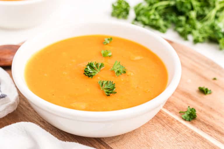 butternut squash soup in white bowl