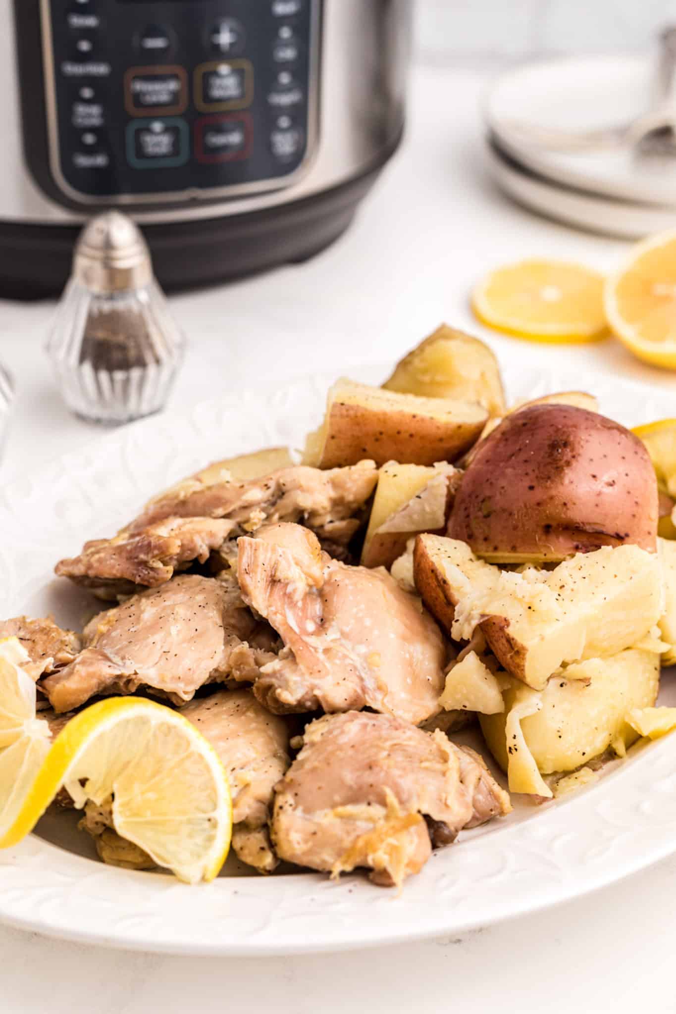 instant pot-cooked chicken thighs and potatoes.