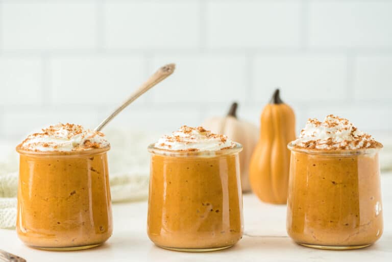 instant pot pumpkin pudding in three jars.