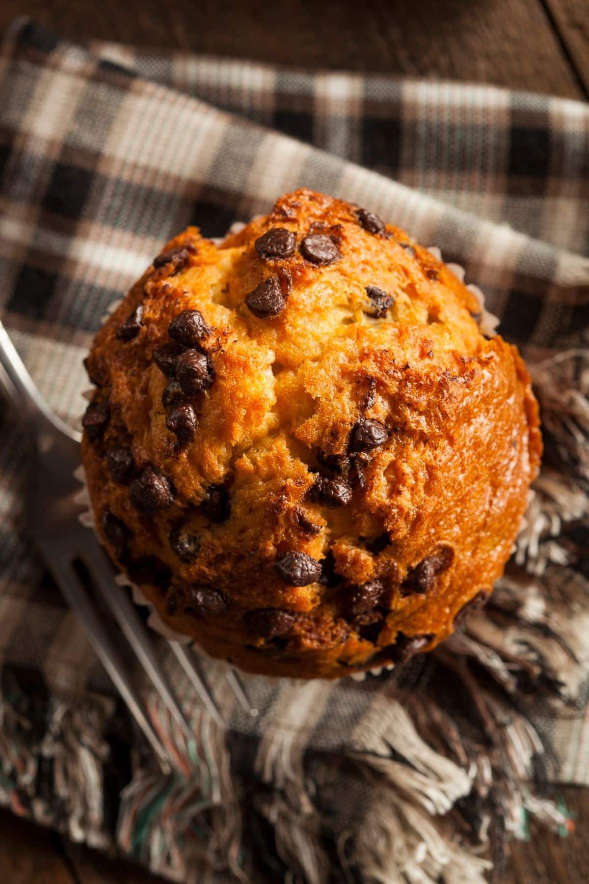 cassava flour muffin and fork on linen.