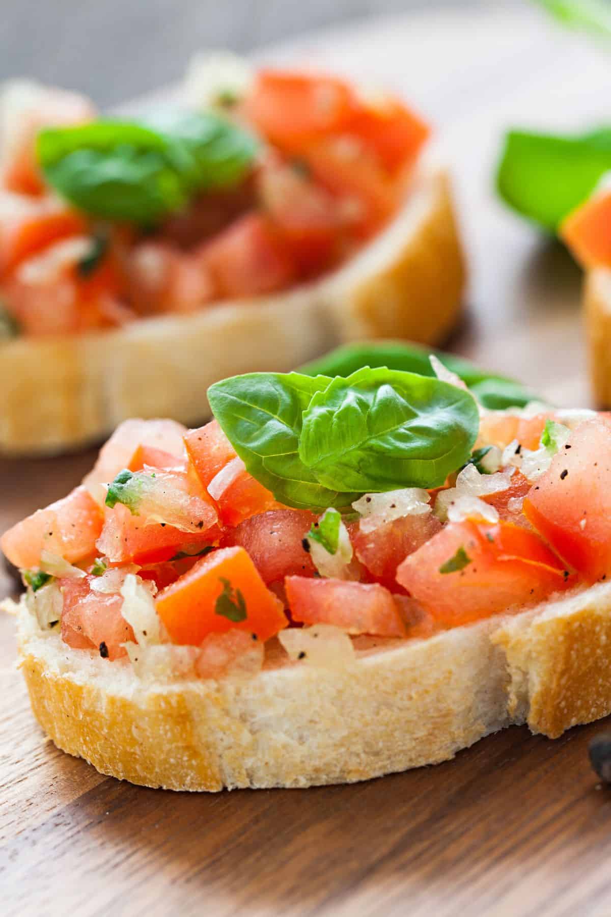 basil on bruschetta toast.