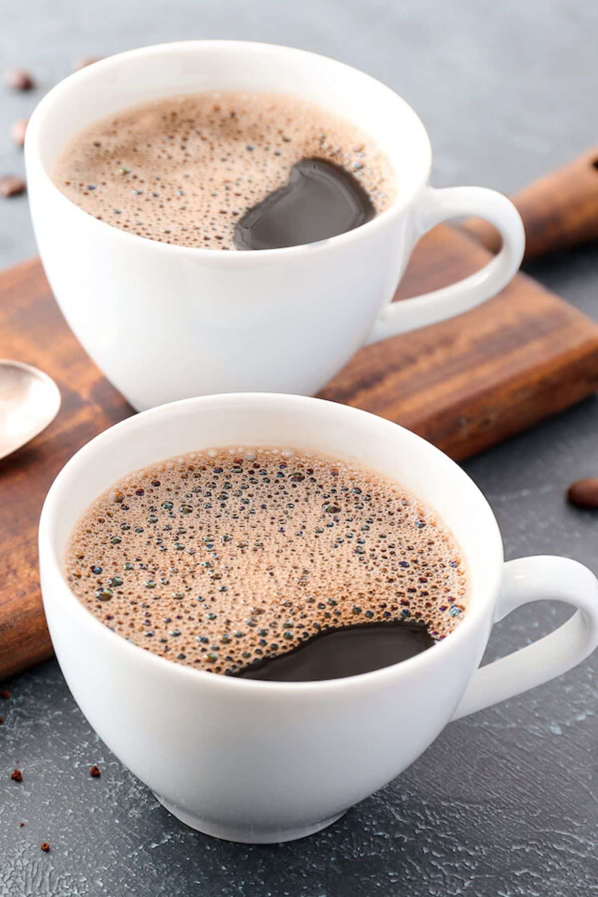 maca coffee on table in white mugs.