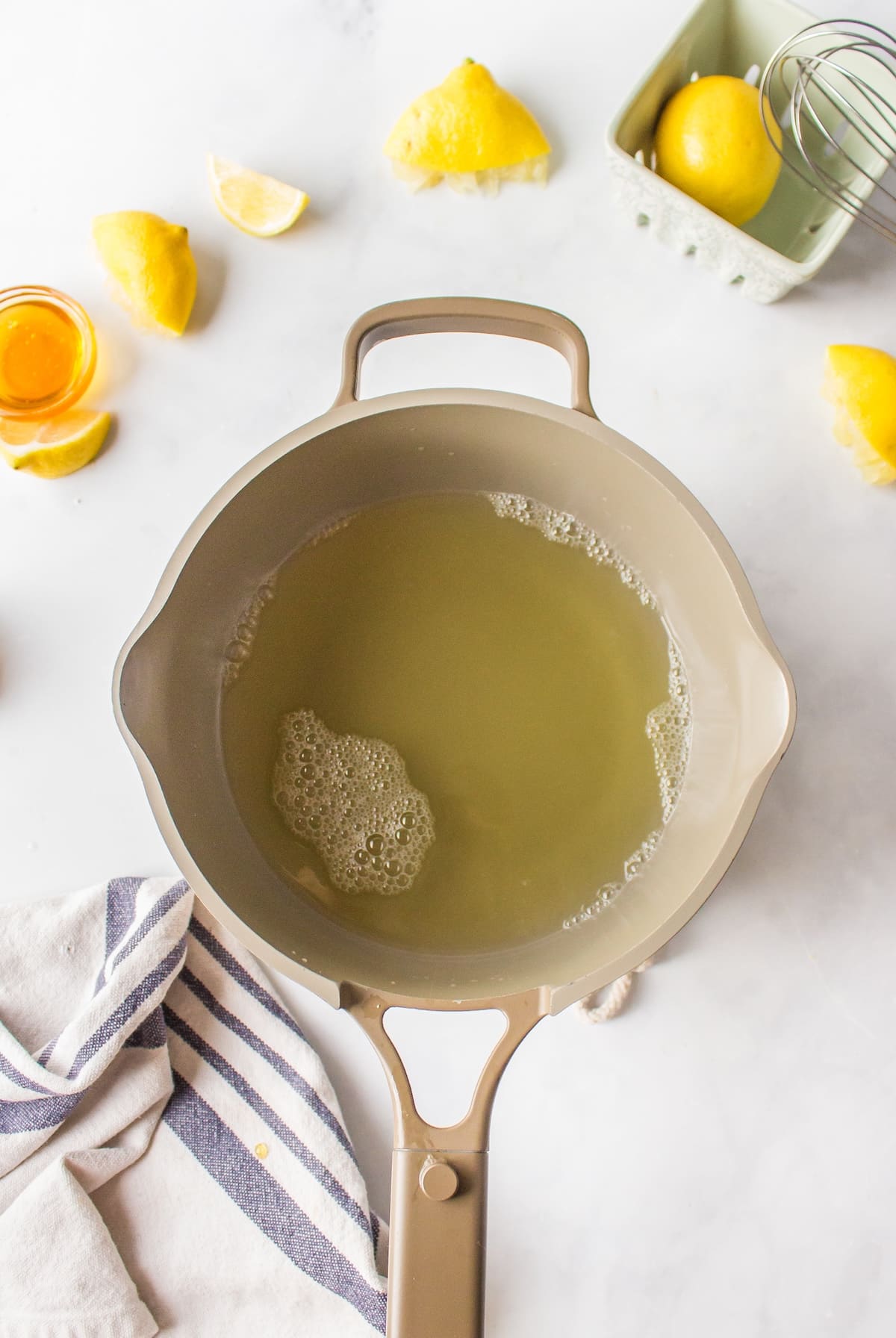 lemon juice and water in saucepan.