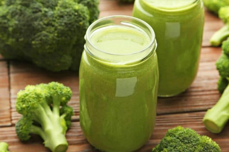 a glass of fresh broccoli juice.