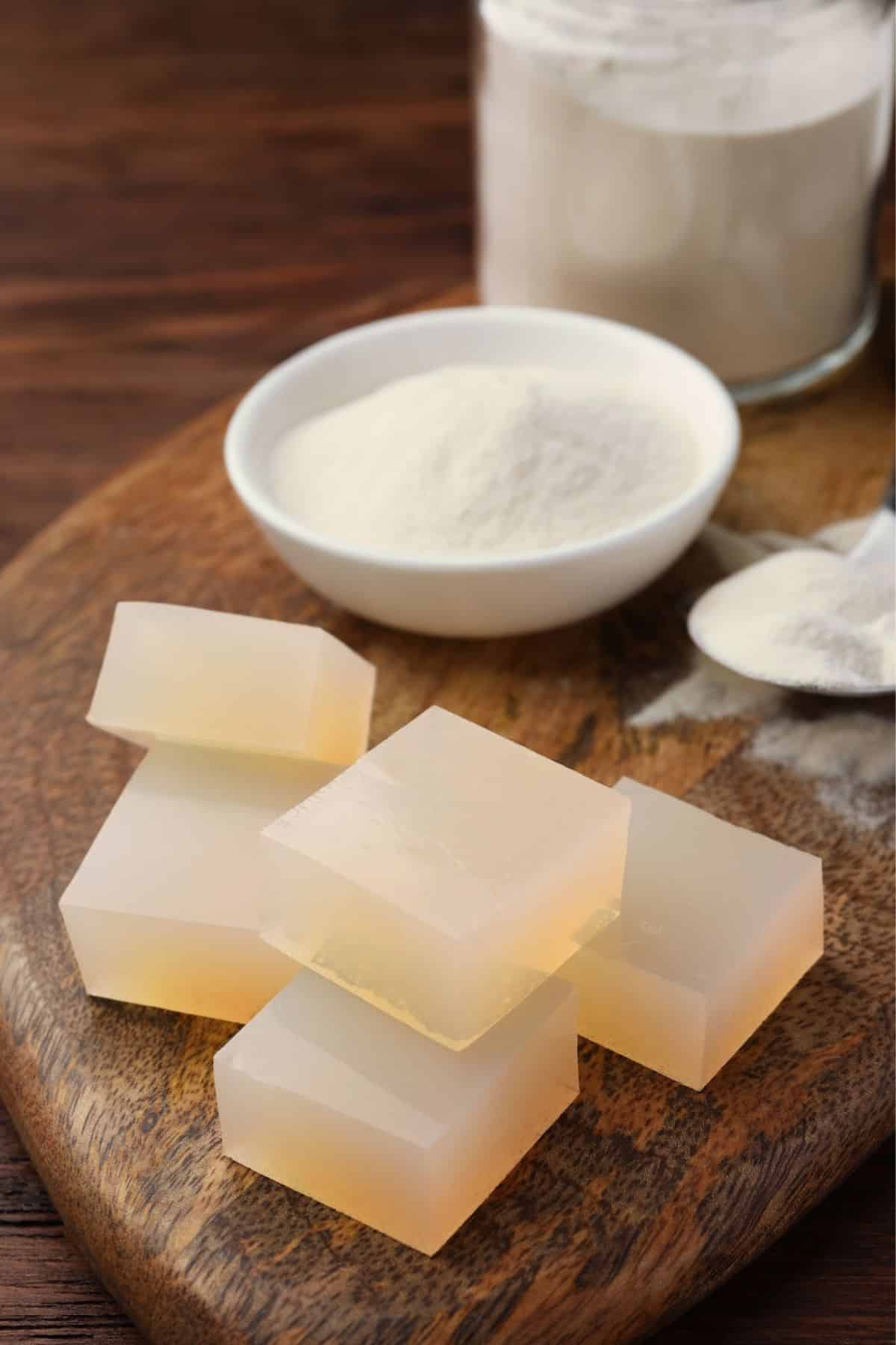 agar agar powder and gummies on a serving tray.