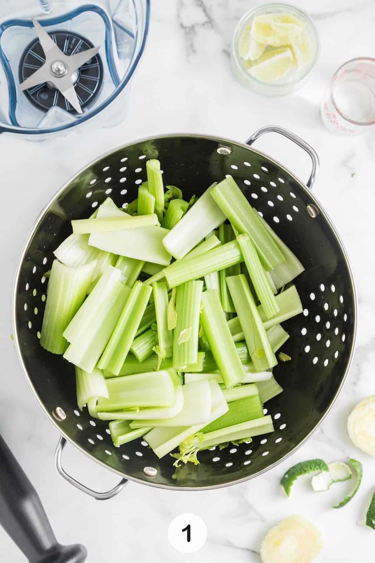 washing celery in colander.