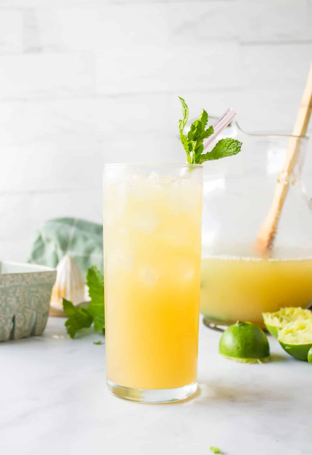 Pineapple Coconut Water in glass with fresh mint.