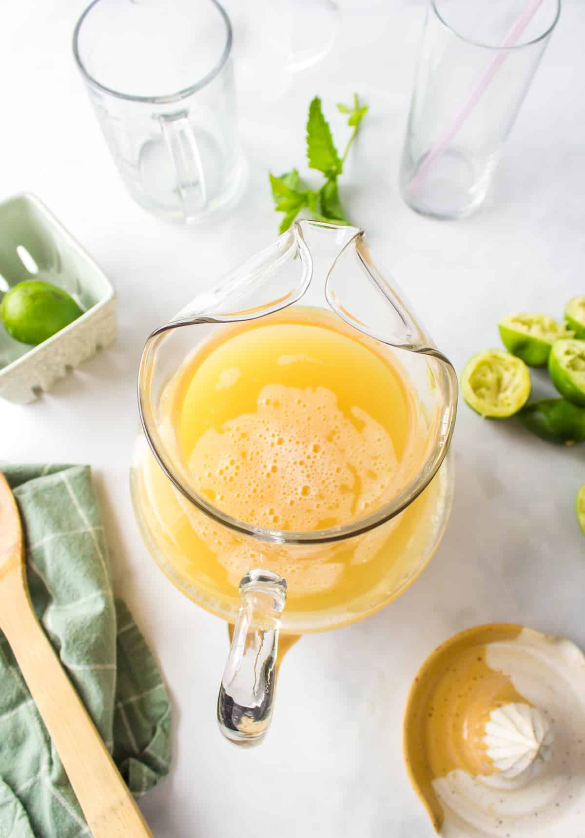 coconut water with pineapple juice in pitcher.